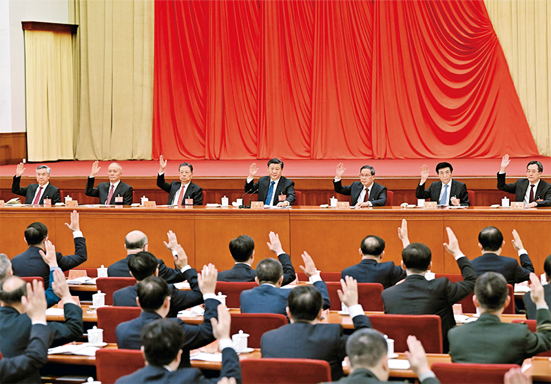 中國共產黨第二十屆中央委員會第二次全體會議，於2023年2月26日至28日在北京舉行。這是習近平、李強、趙樂際、王滬寧、蔡奇、丁薛祥、李希等在主席台上。 新華社記者 謝環馳/攝
